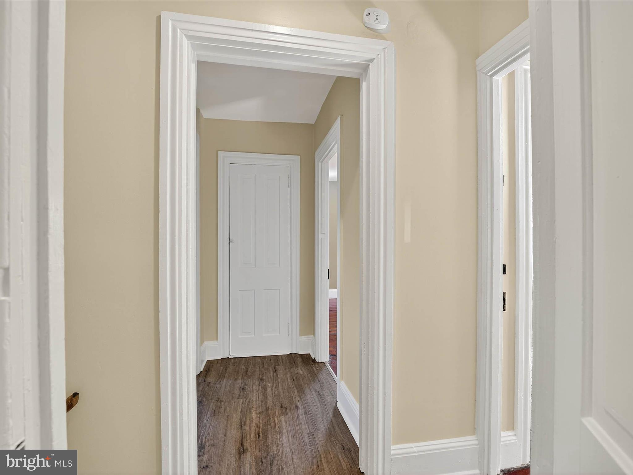5334 Strasburg Road Kinzers, PA 17535 - Photo 32 of 44 a view of a hallway with wooden floor