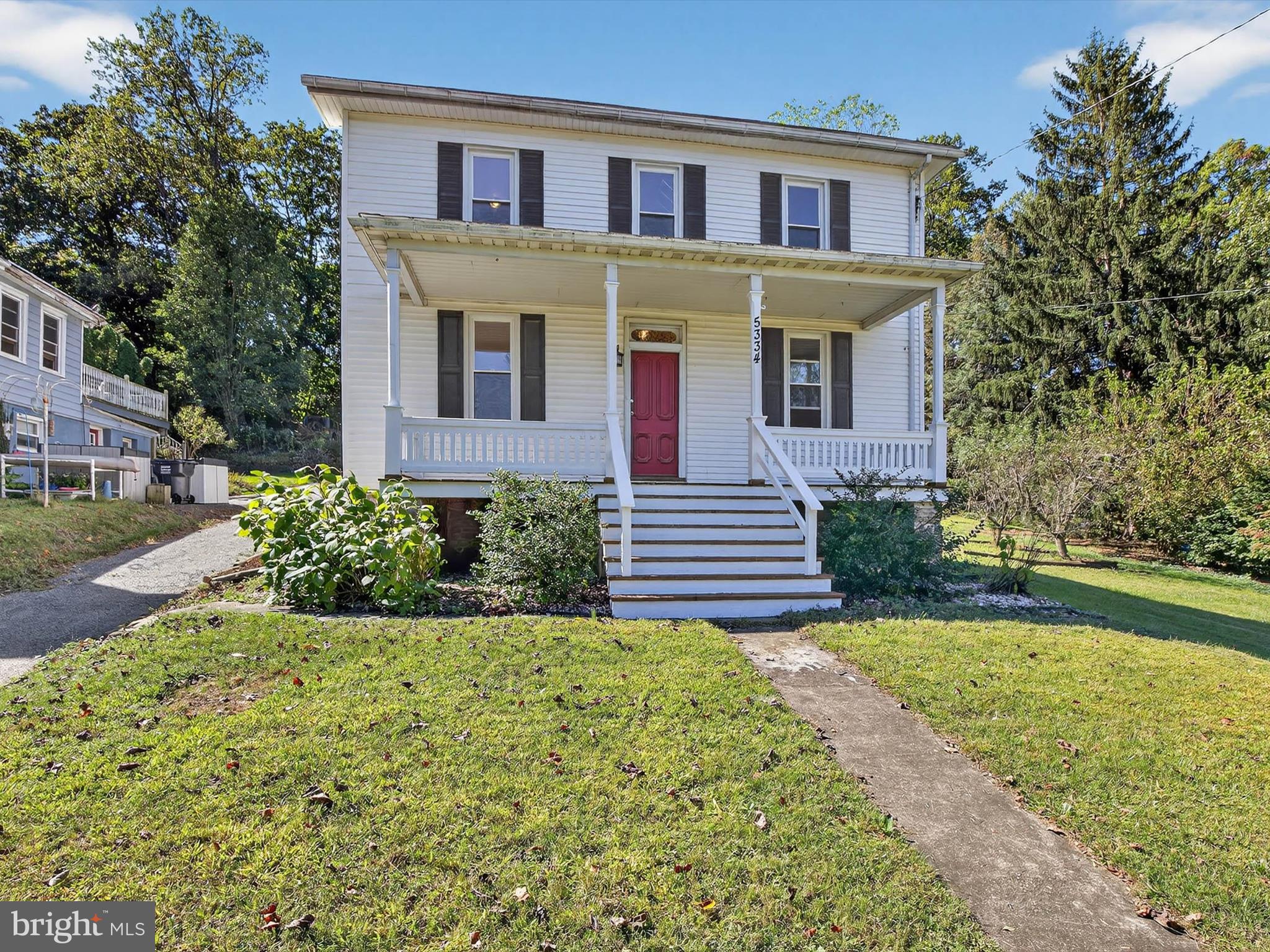 5334 Strasburg Road Kinzers, PA 17535 - Photo 4 of 44 a front view of a house with a yard