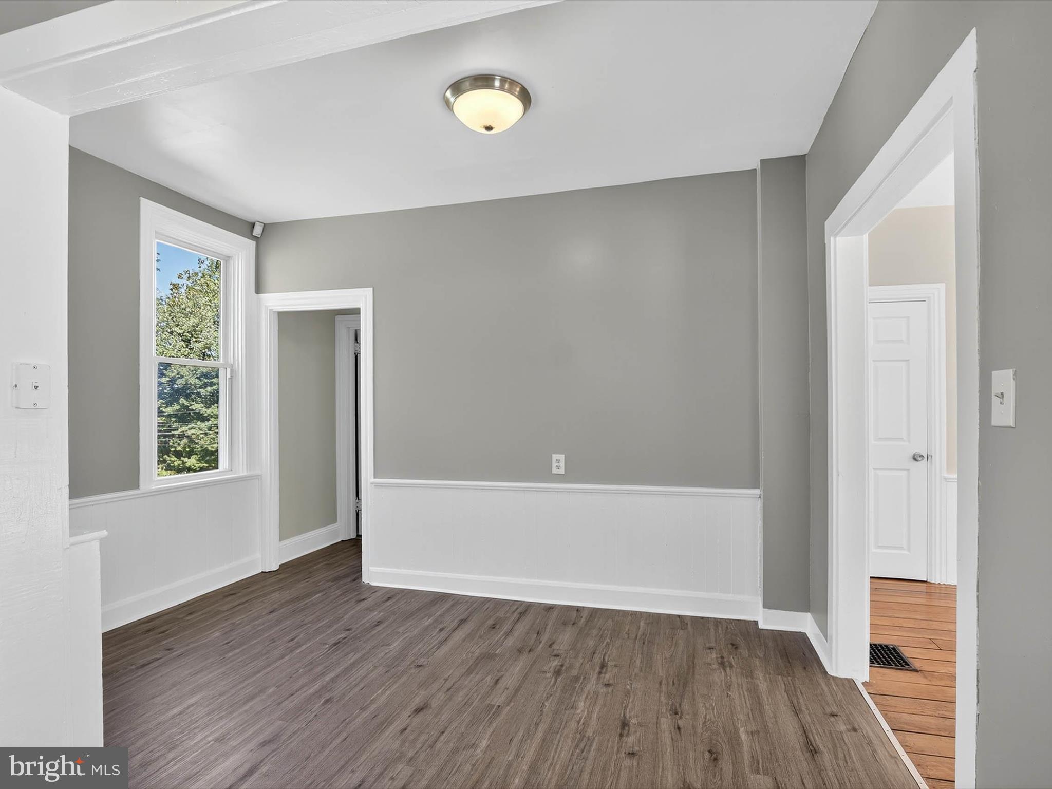 5334 Strasburg Road Kinzers, PA 17535 - Photo 10 of 44 an empty room with wooden floor and windows