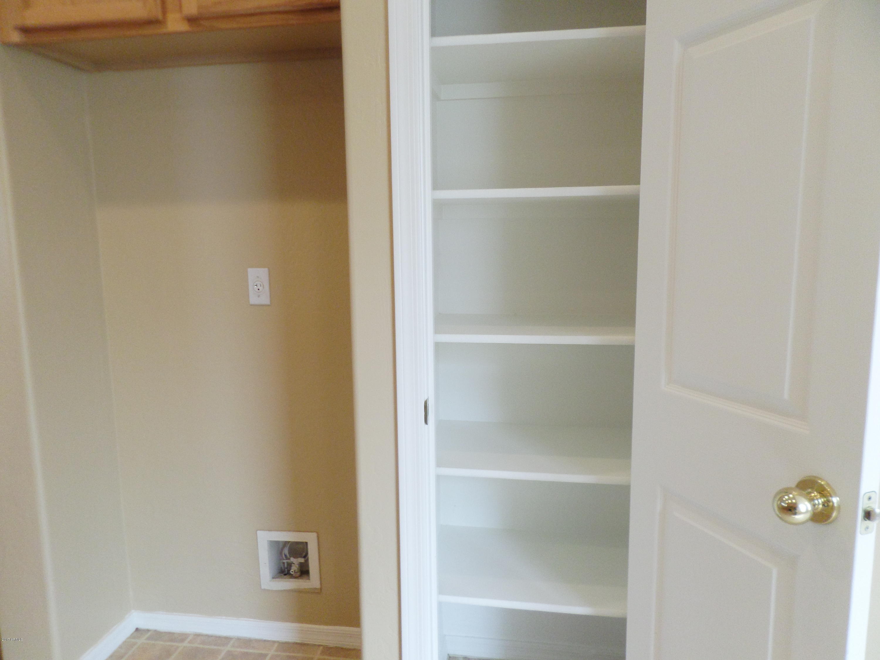 2324 West Carson Road Phoenix, AZ 85041 - Photo 7 of 15 2324 W CARSON PANTRY