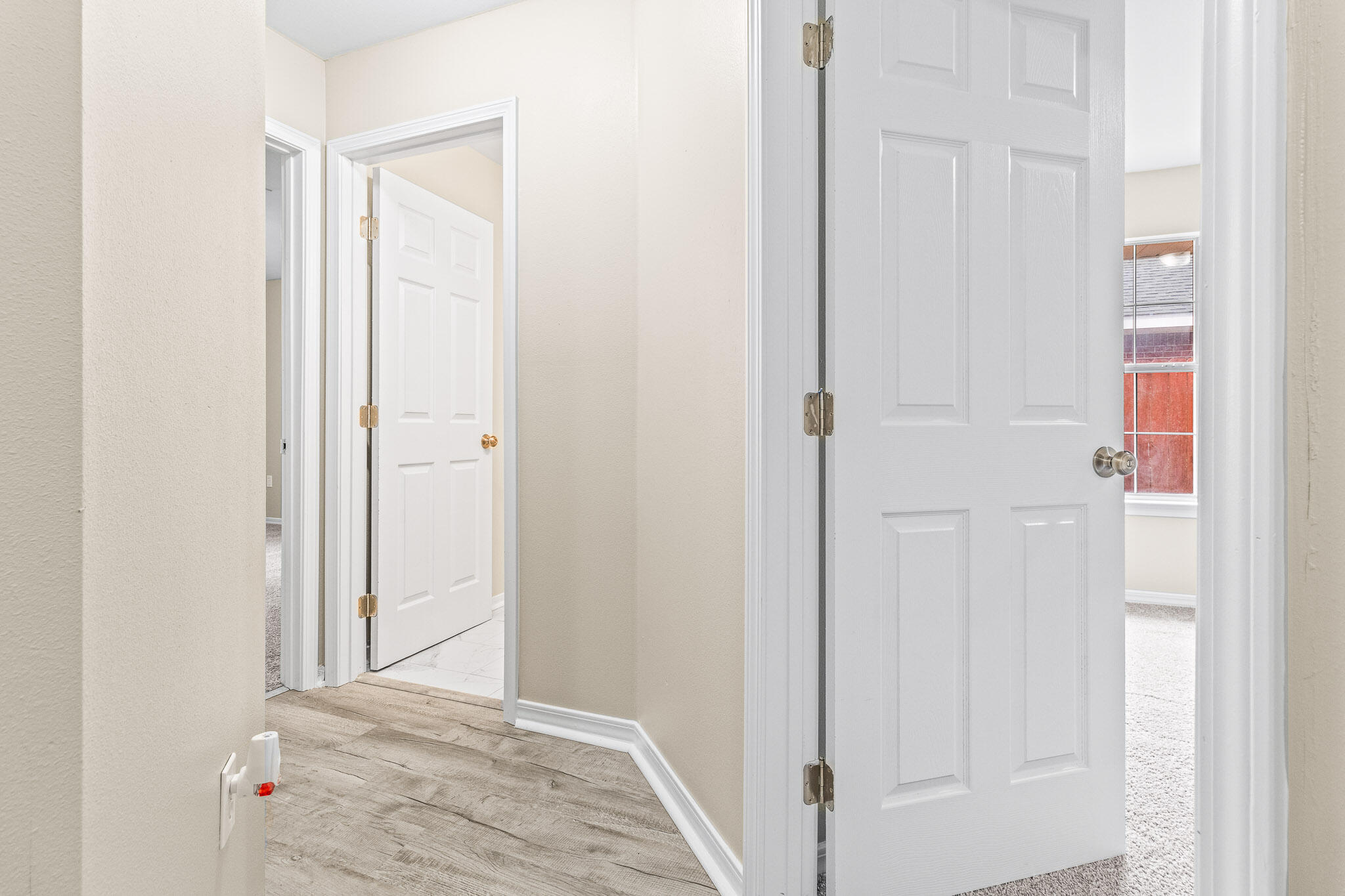 230 Beacon Way Santa Rosa Beach, FL 32459 - Photo 15 of 46 a view of a hallway with wooden floor