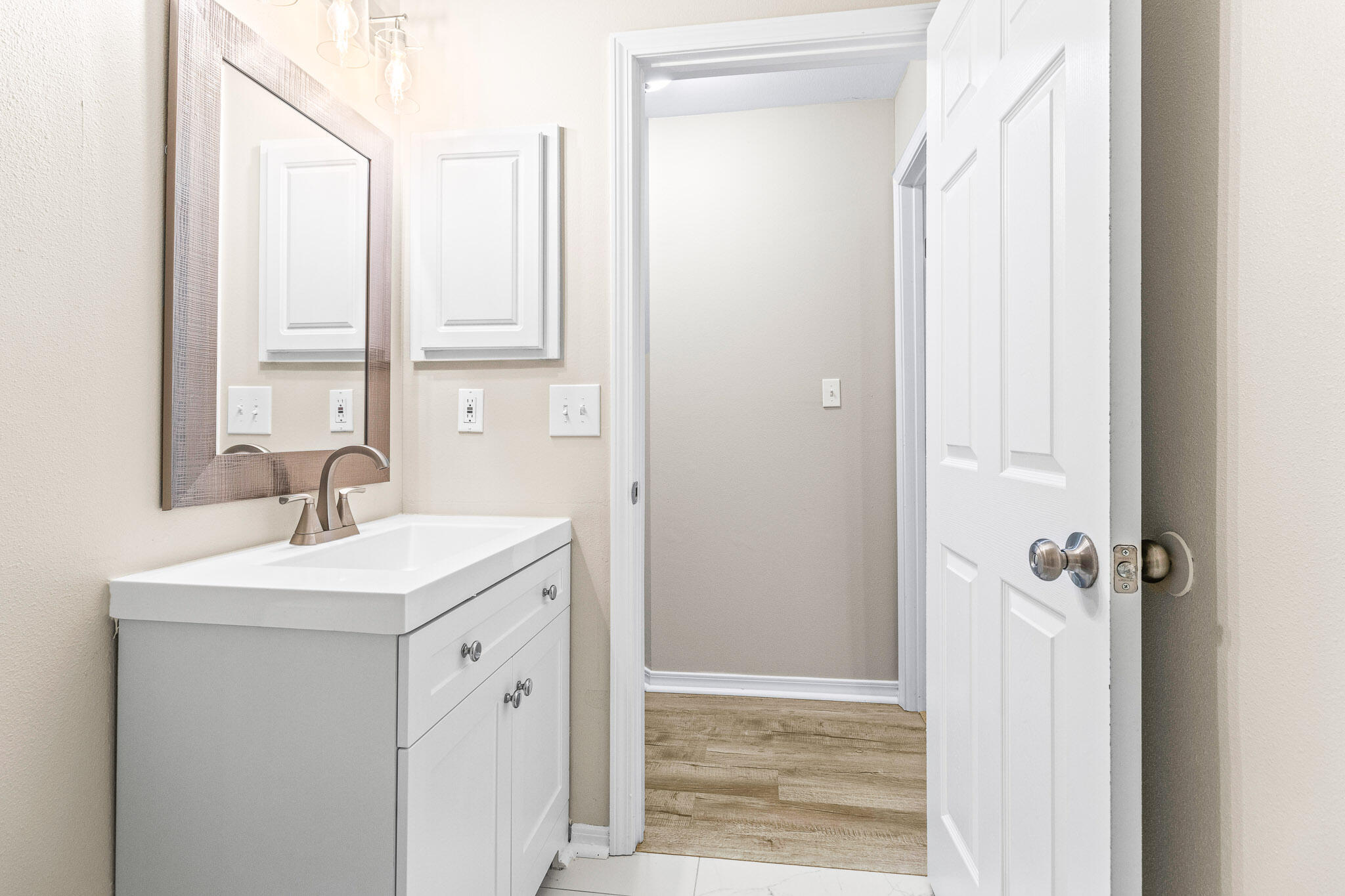230 Beacon Way Santa Rosa Beach, FL 32459 - Photo 21 of 46 a bathroom with a sink a vanity and a mirror