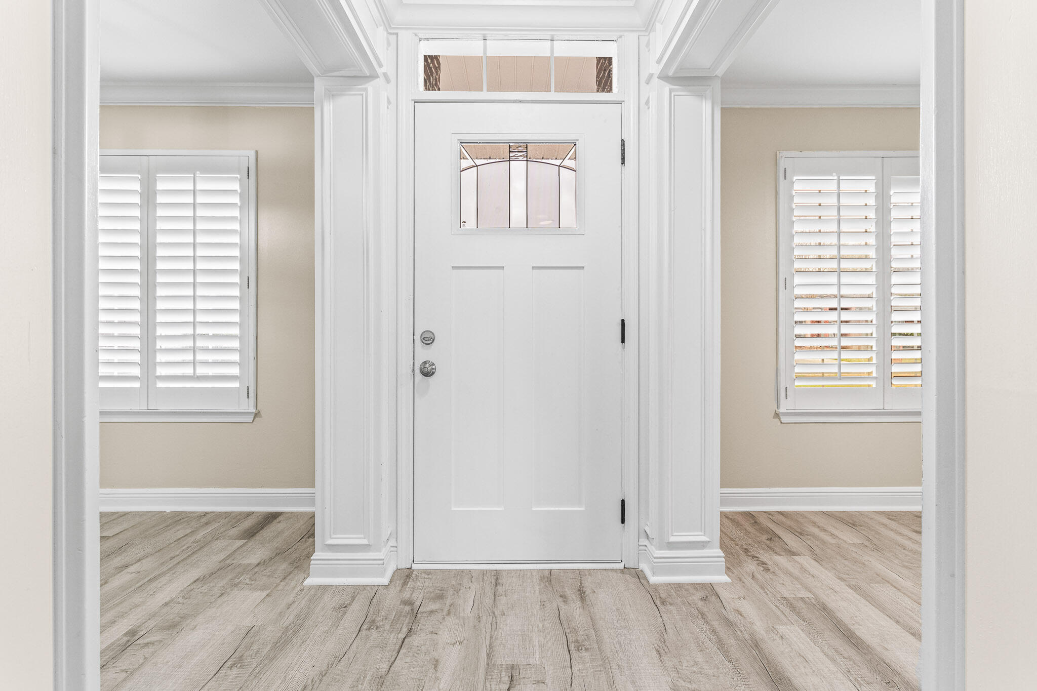 230 Beacon Way Santa Rosa Beach, FL 32459 - Photo 5 of 46 an empty room with wooden floor and windows
