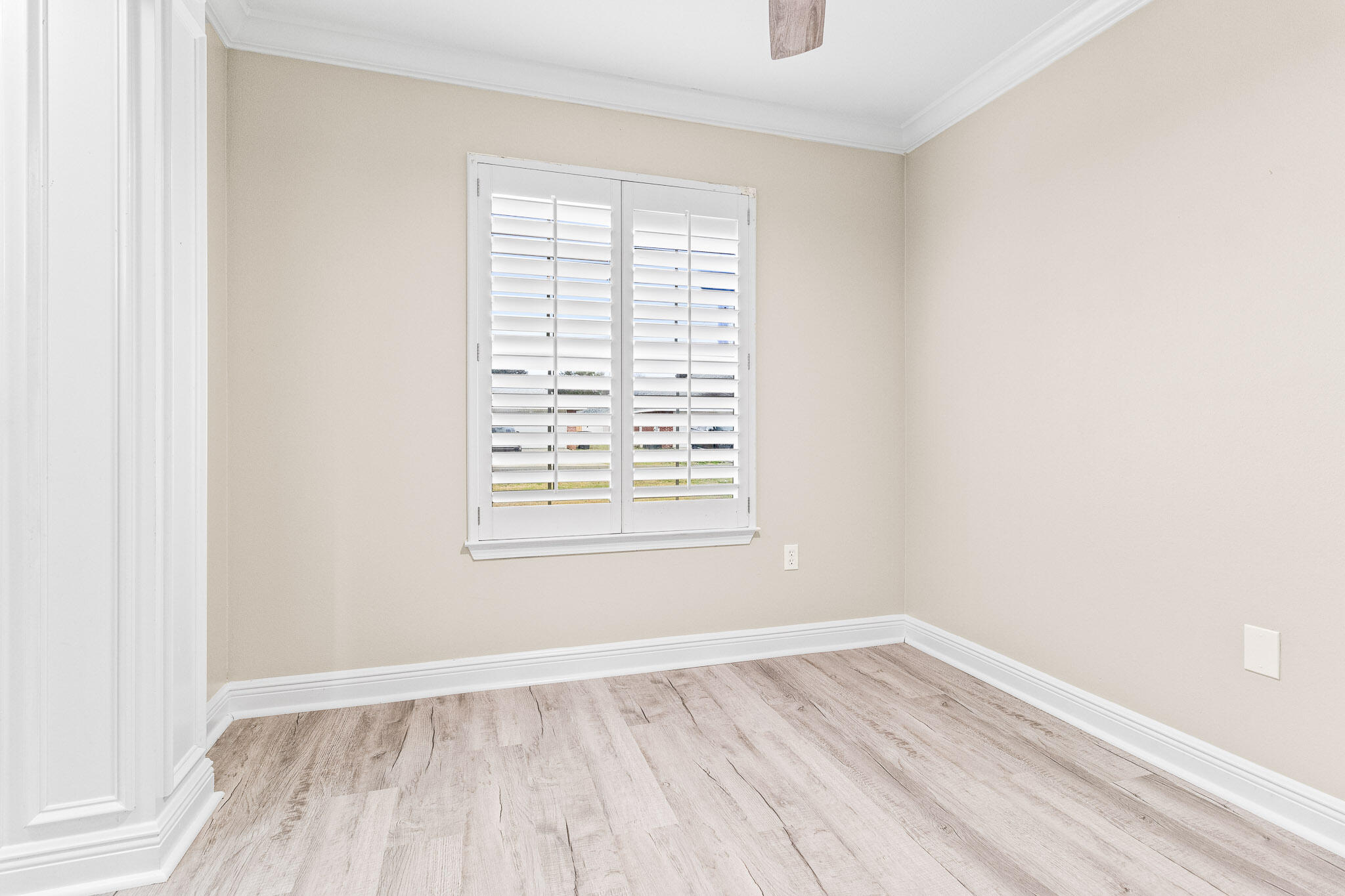 230 Beacon Way Santa Rosa Beach, FL 32459 - Photo 7 of 46 an empty room with wooden floor and windows