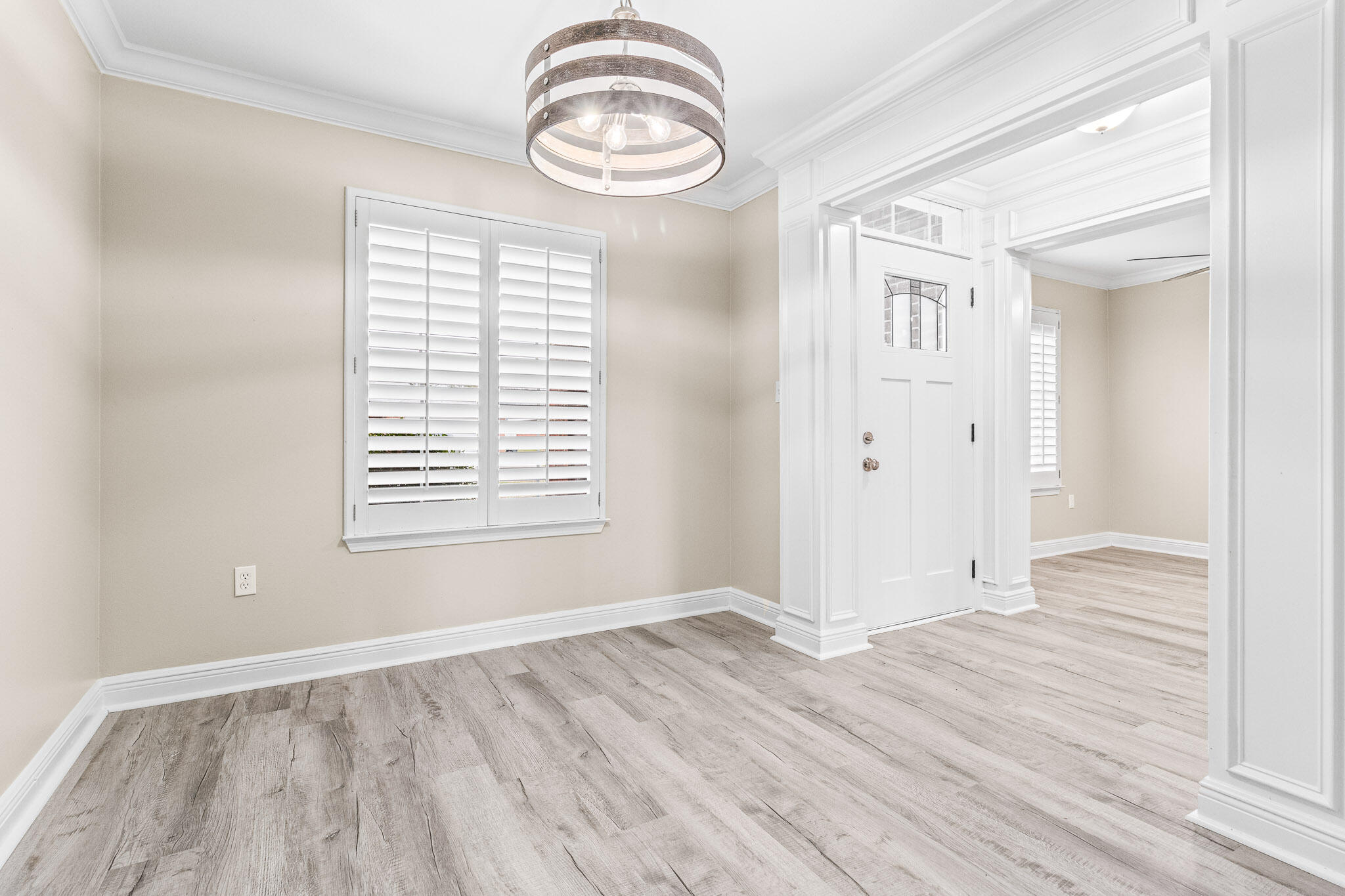 230 Beacon Way Santa Rosa Beach, FL 32459 - Photo 10 of 46 an empty room with wooden floor and windows