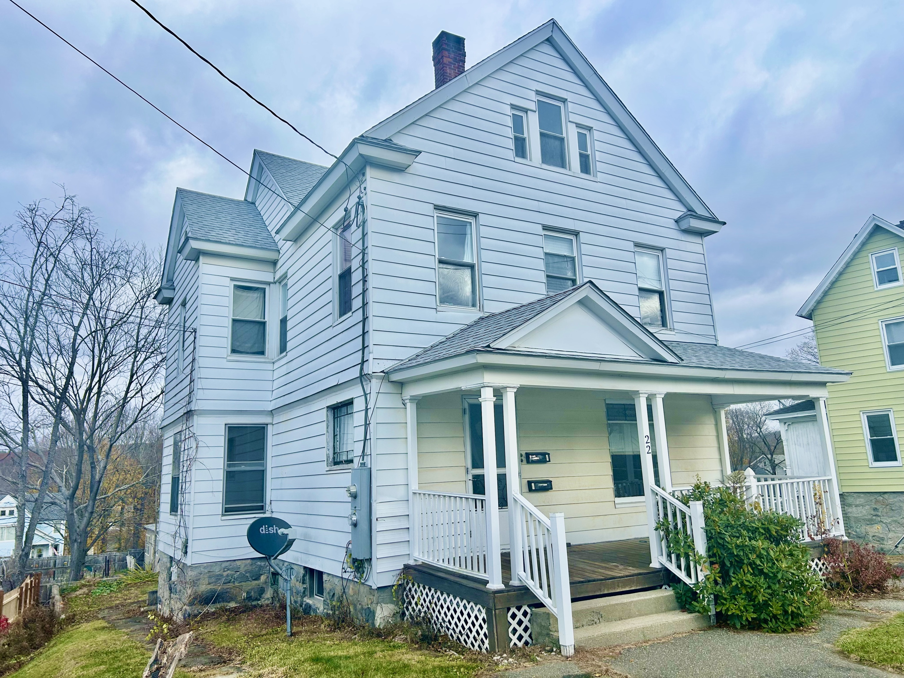 22 Upson Avenue Winchester, CT 06098 - Photo 1 of 10 a front view of a house with garden and porch