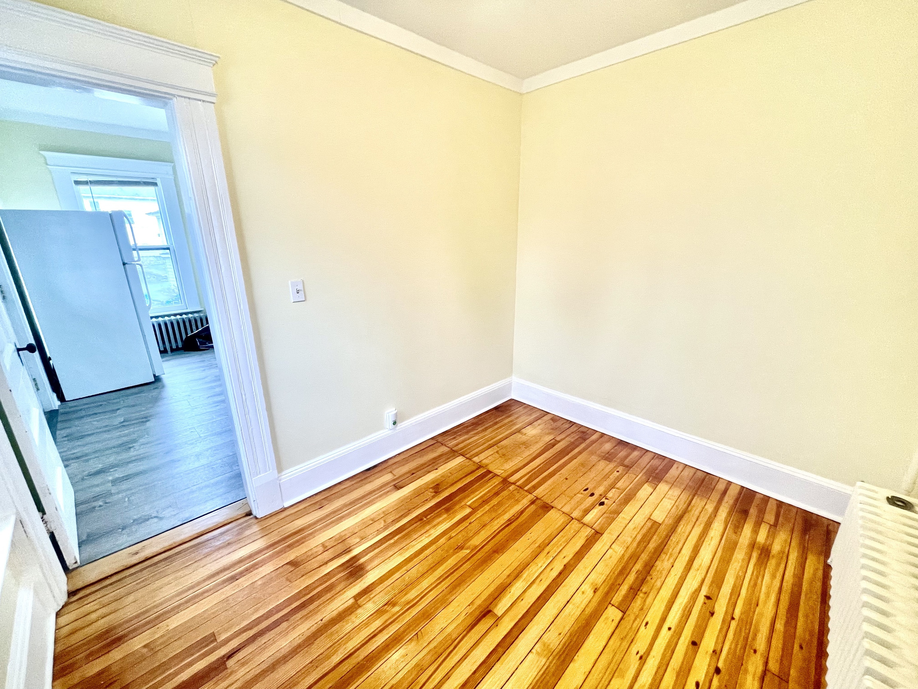 22 Upson Avenue Winchester, CT 06098 - Photo 5 of 10 a view of a room with wooden floor and a carpet