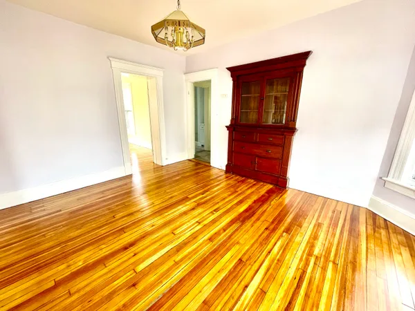 a view of a livingroom with a wooden floor