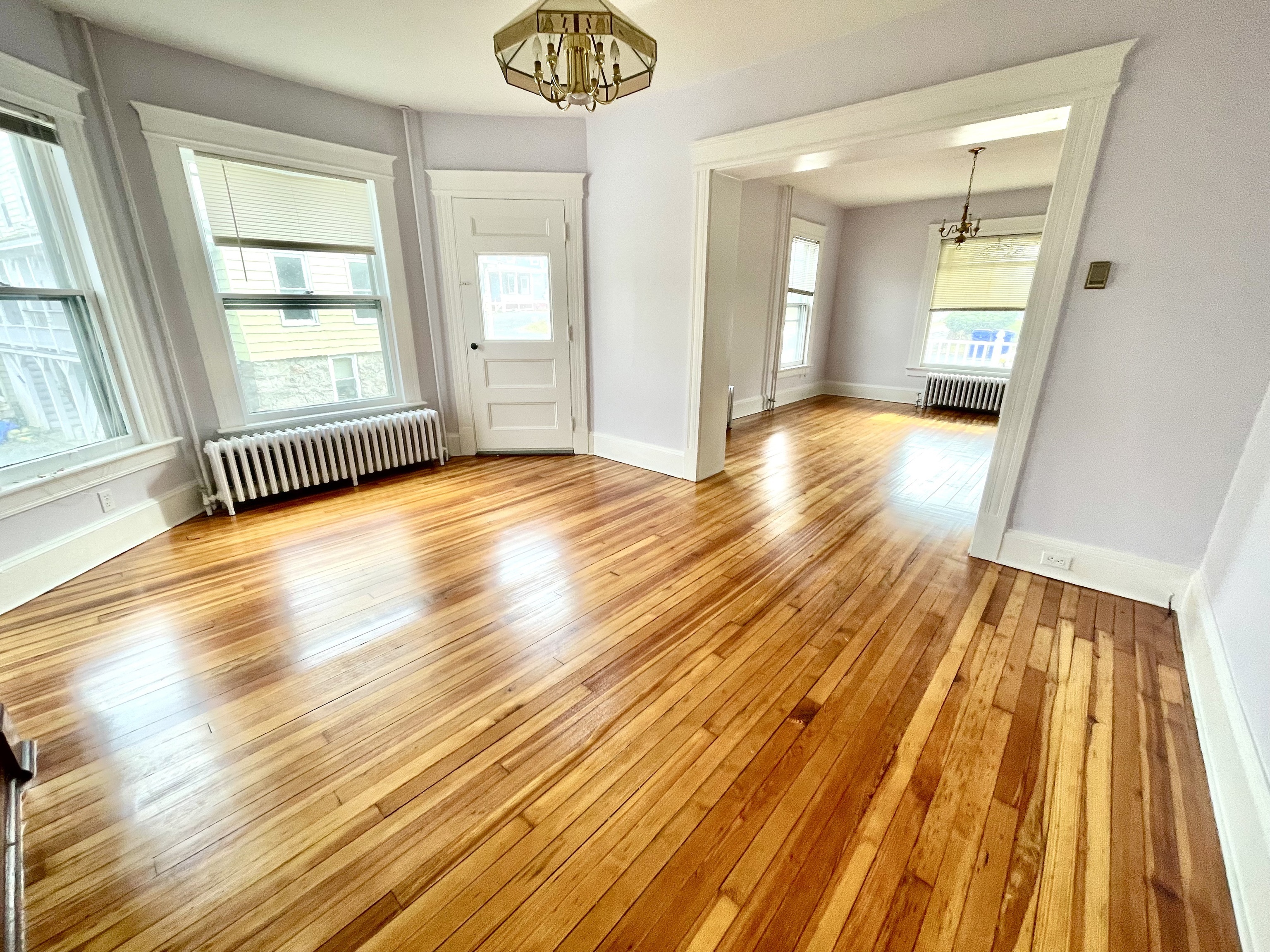 22 Upson Avenue Winchester, CT 06098 - Photo 7 of 10 a view of a room with wooden floor and windows