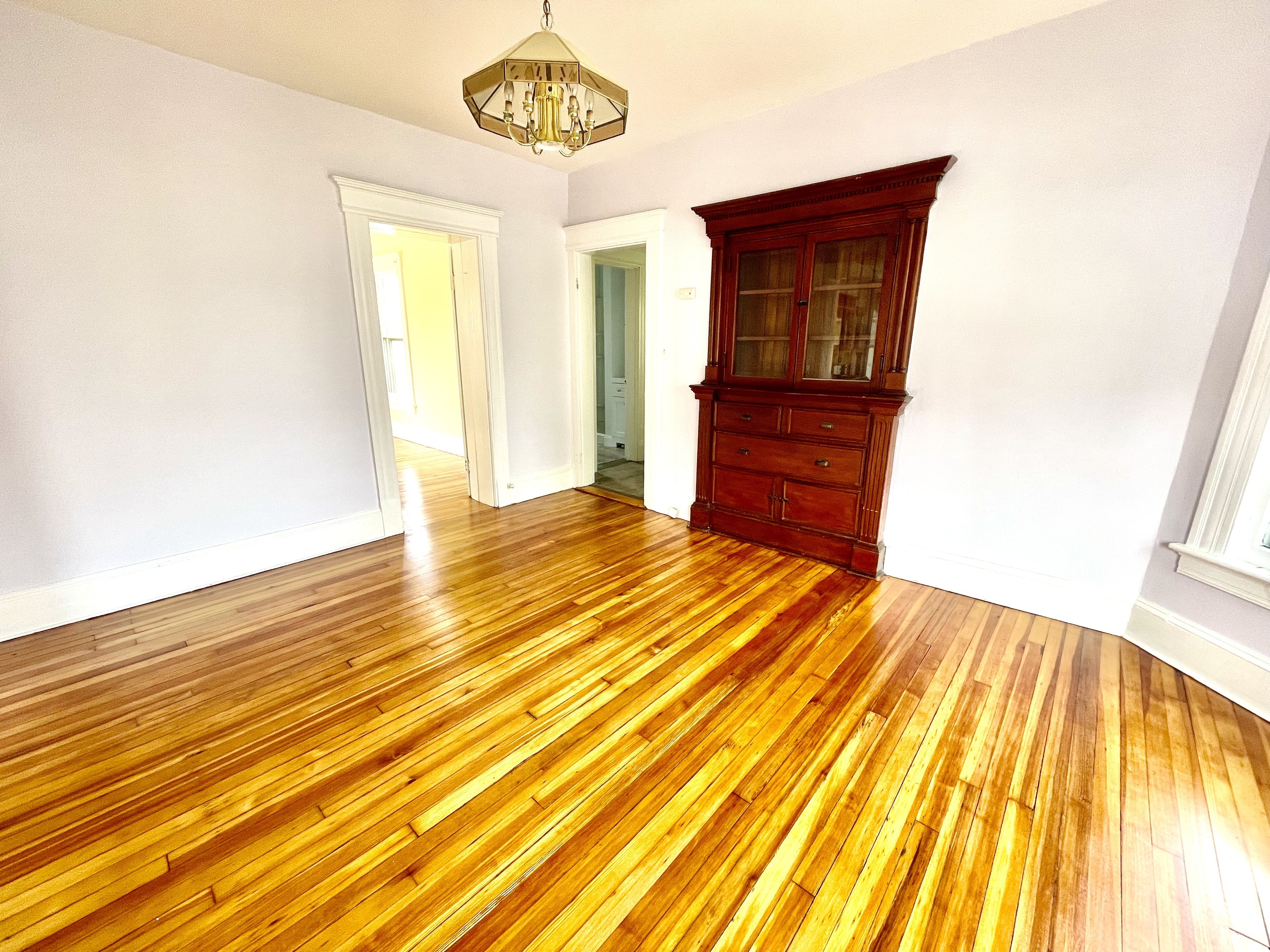 22 Upson Avenue Winchester, CT 06098 - Photo 8 of 10 a view of a livingroom with a wooden floor
