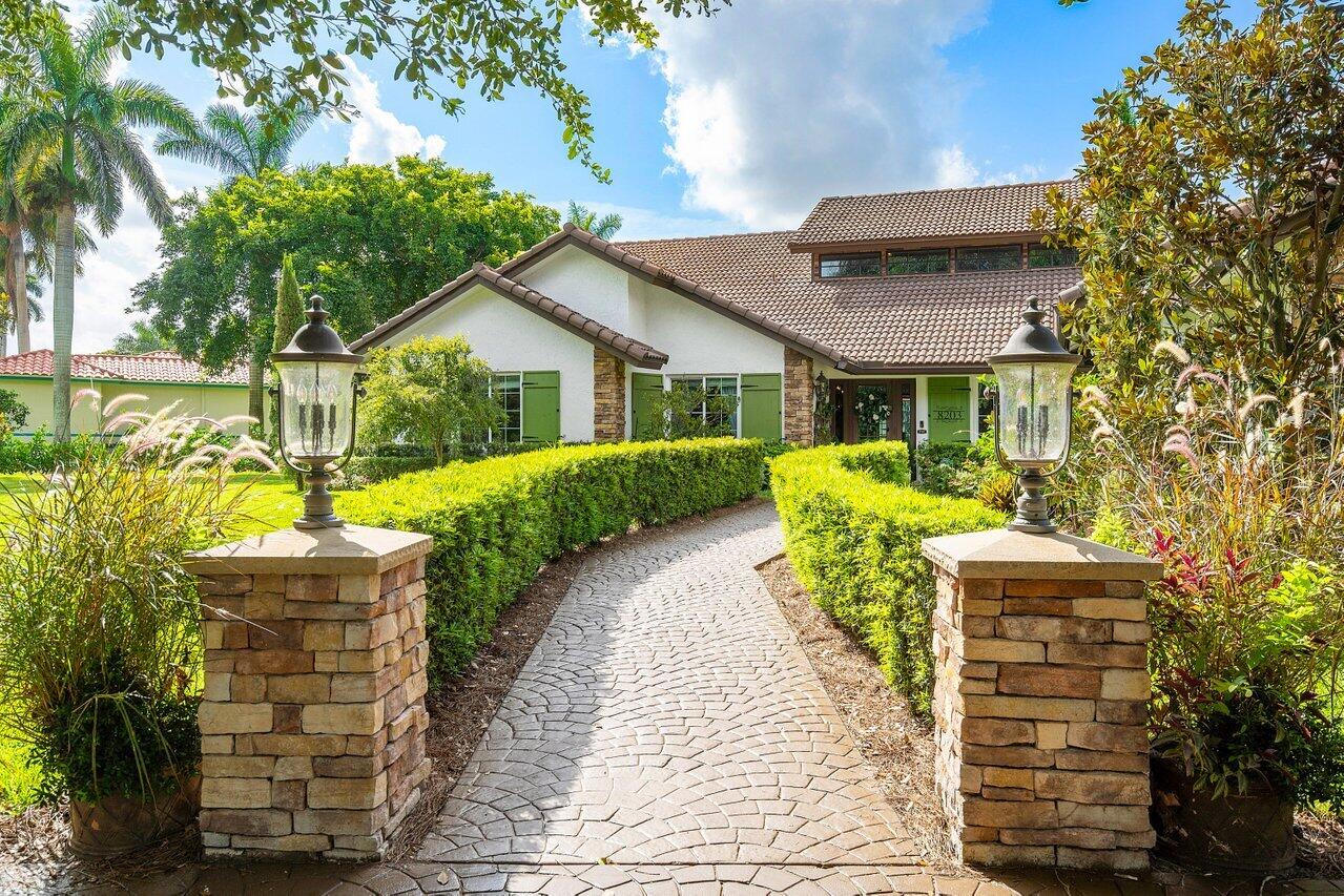 8203 Sawpine Road Delray Beach, FL 33446 - Photo 4 of 82 Entrance