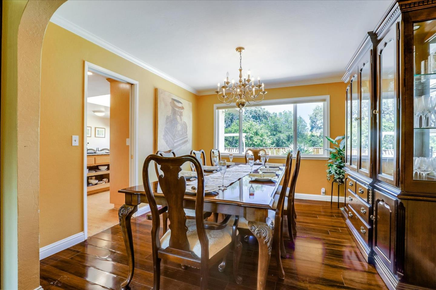 7166 Brooktree Way San Jose, CA 95120 - Photo 16 of 48 a view of a dining room with furniture window and wooden floor