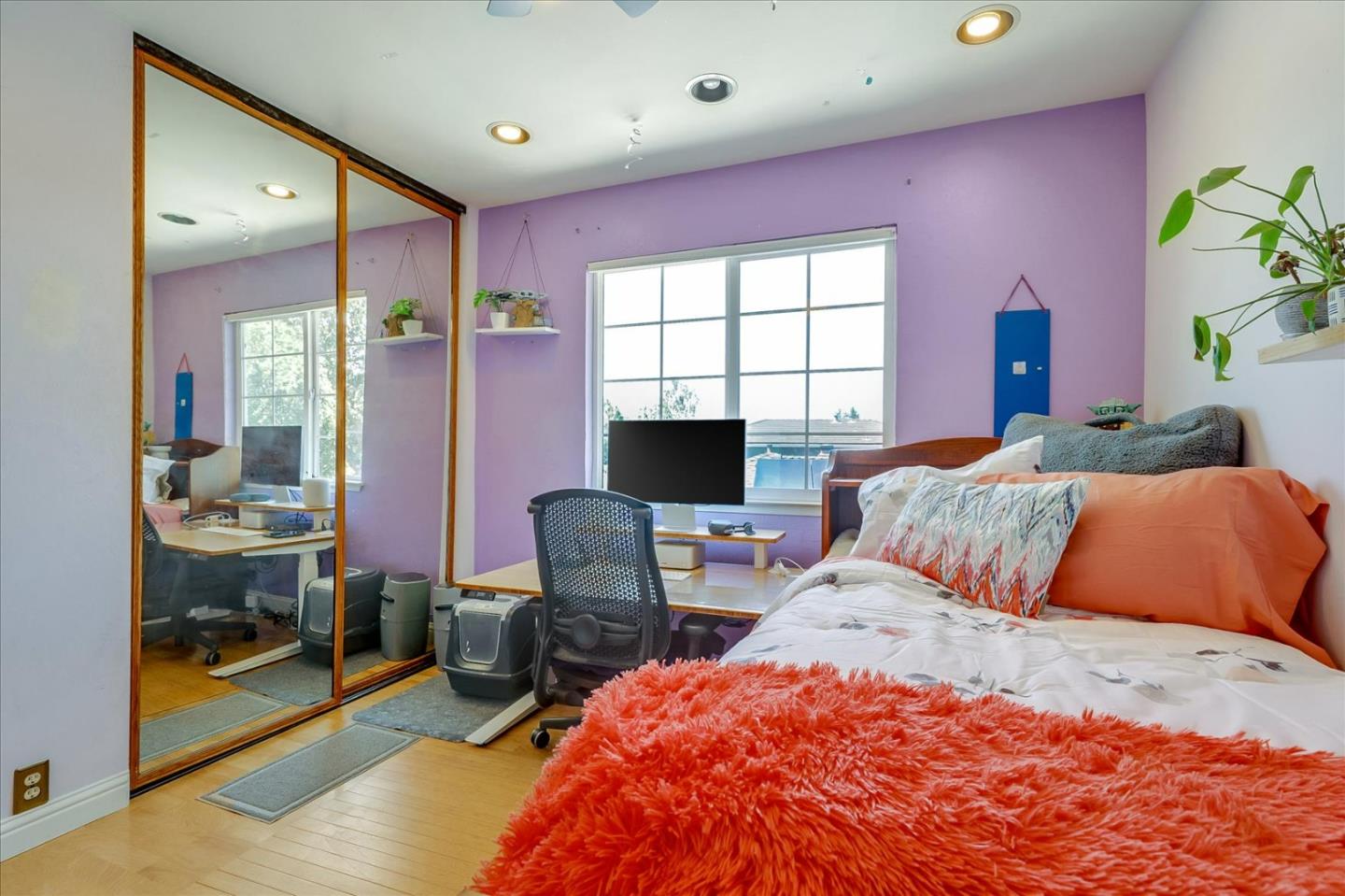 7166 Brooktree Way San Jose, CA 95120 - Photo 21 of 48 a bedroom with a bed and wooden floor