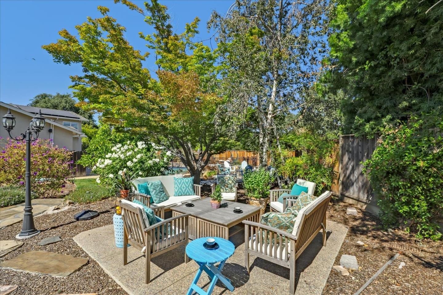 7166 Brooktree Way San Jose, CA 95120 - Photo 42 of 48 a view of a patio with table and chairs and potted plants