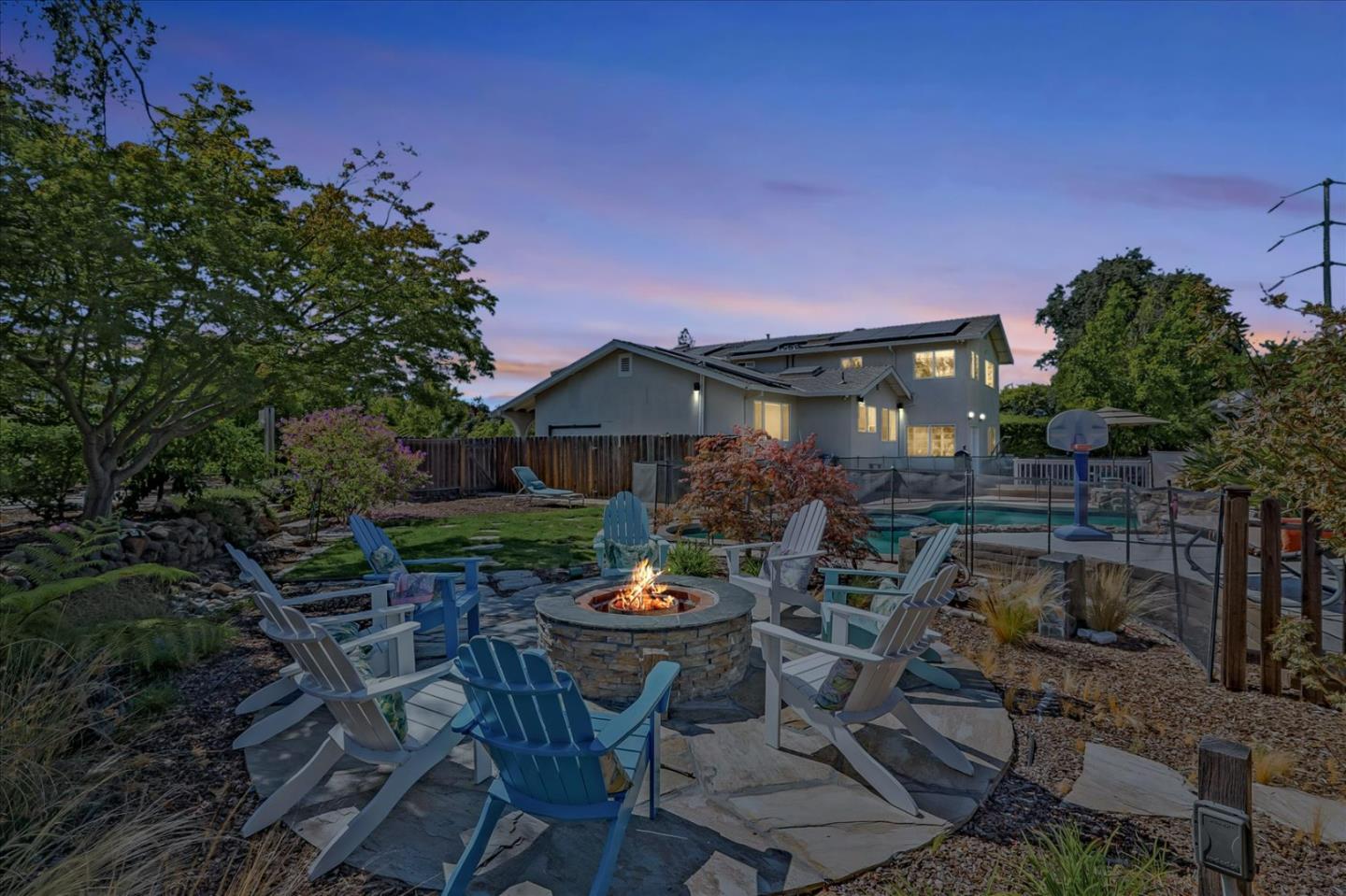 7166 Brooktree Way San Jose, CA 95120 - Photo 46 of 48 a backyard of a house with table and chairs potted plants and large tree