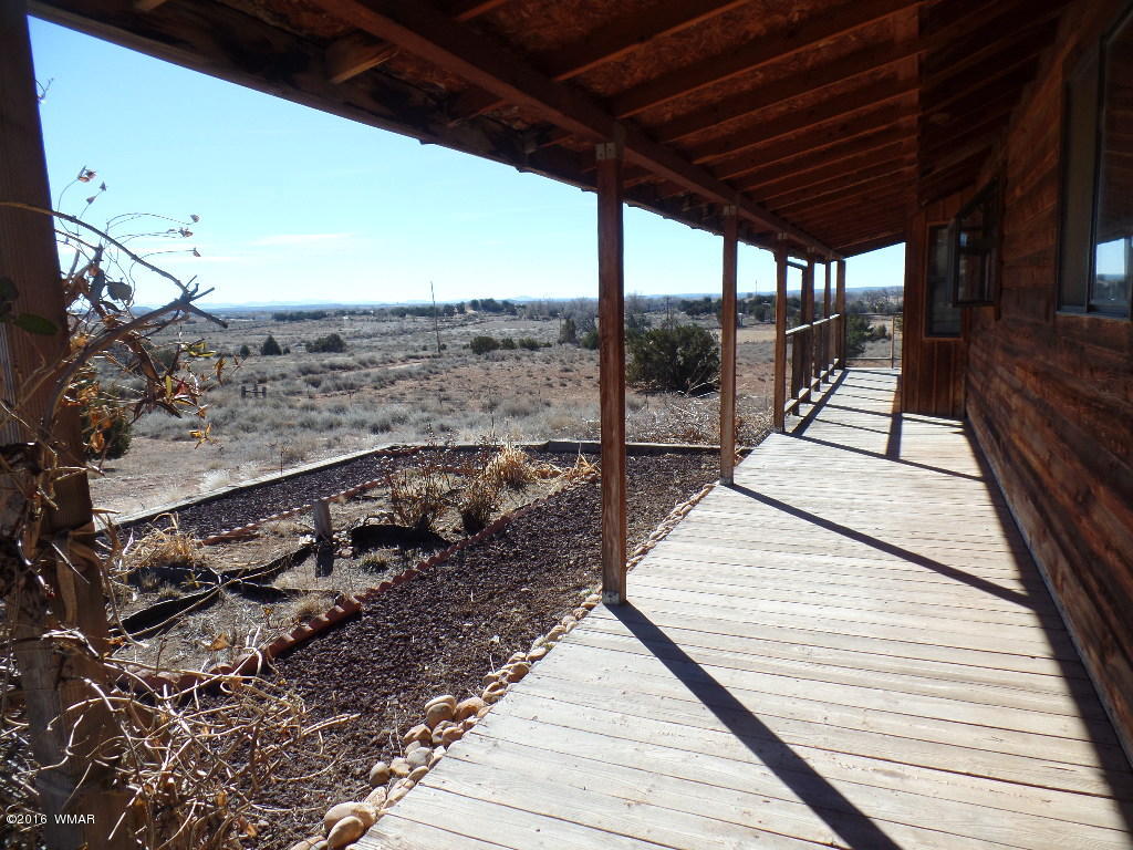 1124 North 650 Street Snowflake, AZ 85937 - Photo 3 of 35 a view of a balcony with wooden floor