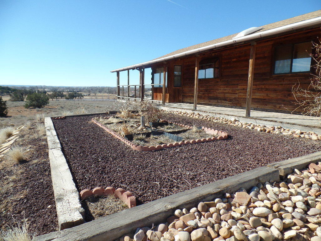 1124 North 650 Street Snowflake, AZ 85937 - Photo 4 of 35 a view of a house with a porch