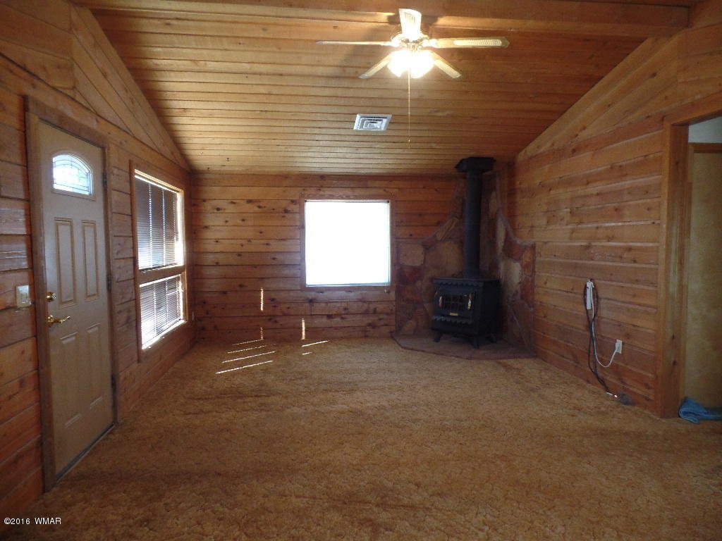 1124 North 650 Street Snowflake, AZ 85937 - Photo 7 of 35 a view of empty room with a fireplace