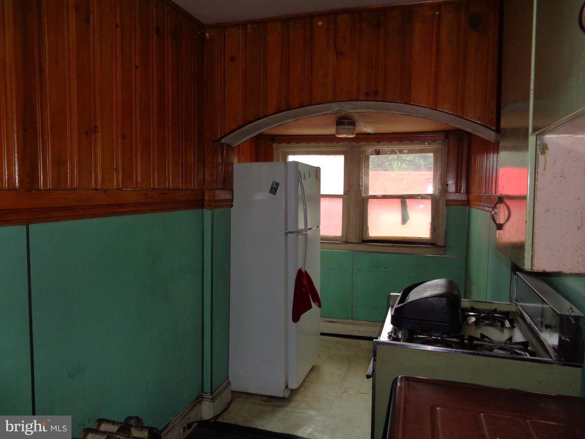 4636 Kraydor Street Philadelphia, PA 19136 - Photo 7 of 13 a room with cabinets and a fireplace