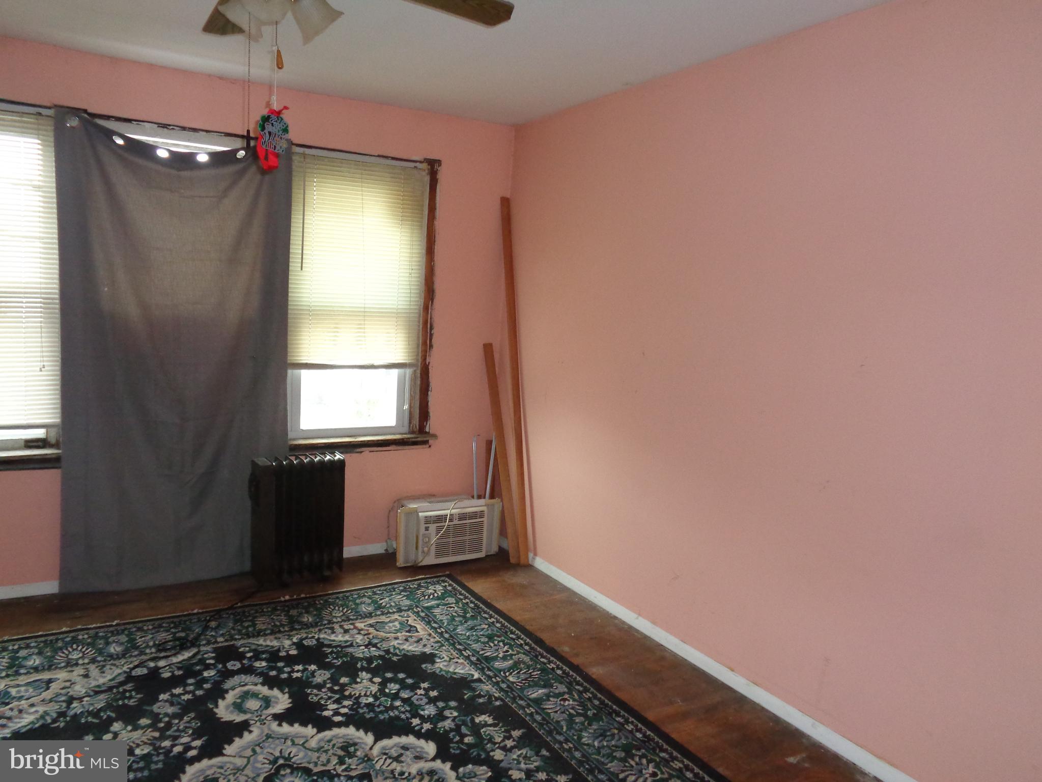 4636 Kraydor Street Philadelphia, PA 19136 - Photo 8 of 13 a view of a livingroom with window and stairs