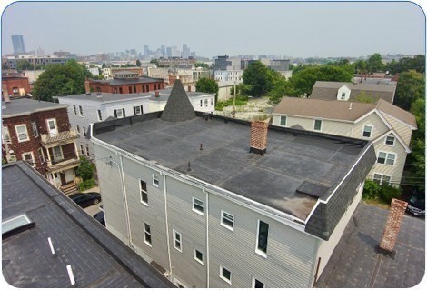 69 Burrell Street Boston, MA 02119 - Photo 2 of 9 a view of a city from a balcony