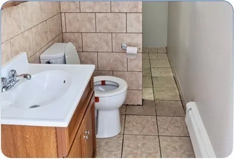 a bathroom with a sink and toilet