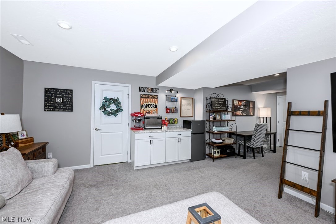 3021 Stonehurst Road Uniontown, OH 44685 - Photo 34 of 48 *ADDED DRY BAR W/LIGHTING ABOVE IT, MINI FRIDGE/FREEZER. FAMILY ROOM FOR ADDITIONAL ENTERTAINING AND COZY MOVIE NIGHTS! ~