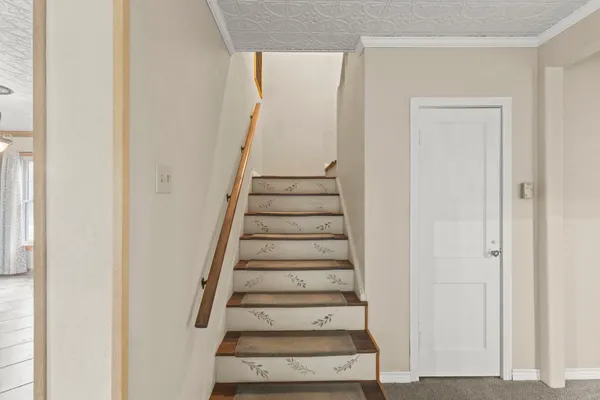 a view of entryway with wooden floor