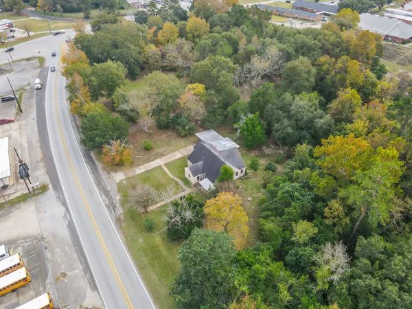 a front view of a house with yard