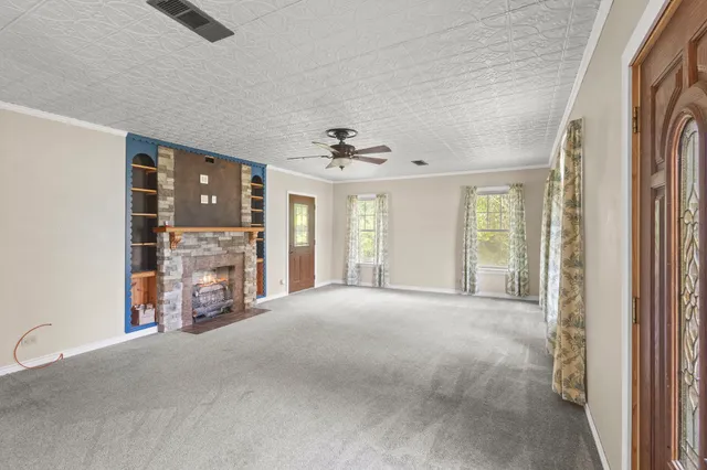 a view of a livingroom with a fireplace