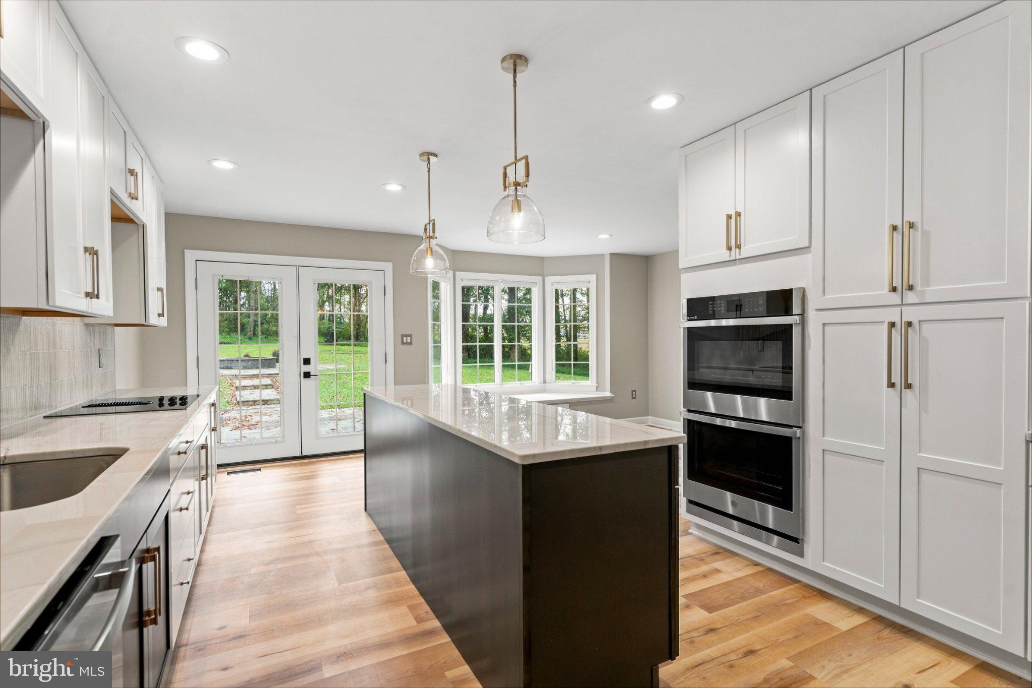 41433 Red Hill Road Leesburg, VA 20175 - Photo 12 of 45 The Kitchen Flows onto the Back Patio