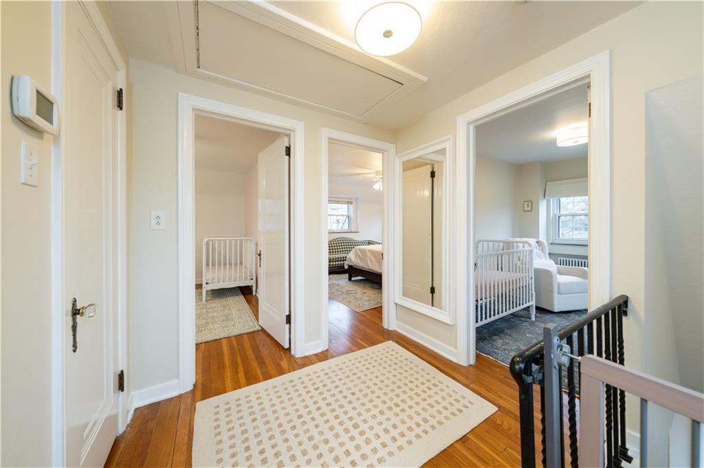 111 Sycamore Drive Pittsburgh, PA 15237 - Photo 15 of 24 a bedroom with a bed and wooden floor