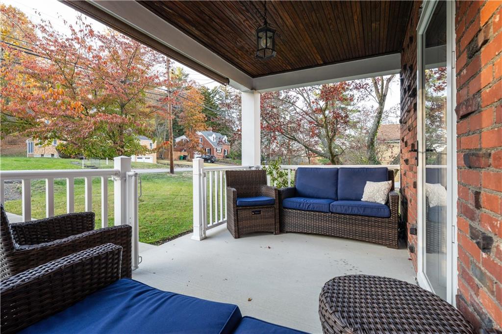 111 Sycamore Drive Pittsburgh, PA 15237 - Photo 4 of 24 a living room with furniture and a floor to ceiling window