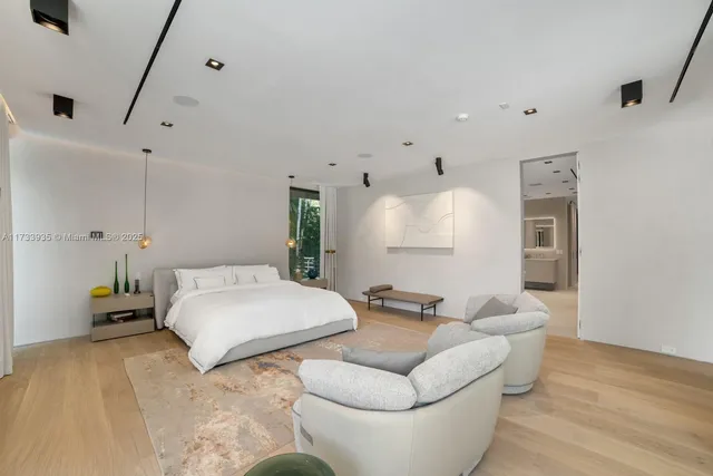 a view of a living room and hardwood floor