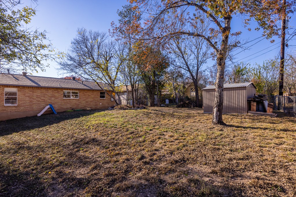 608 Rees Street Kerrville, TX 78028 - Photo 15 of 17 a view of a yard with a house