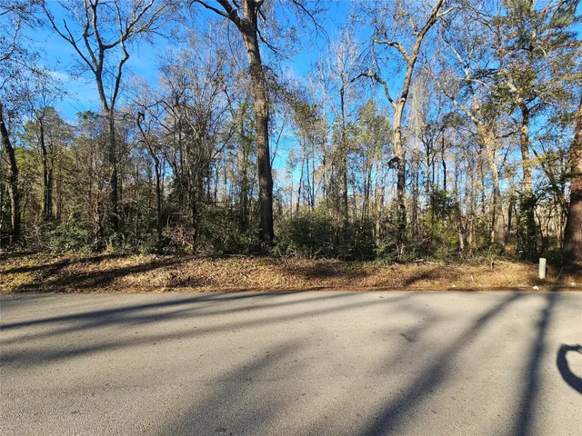 a view of road with trees