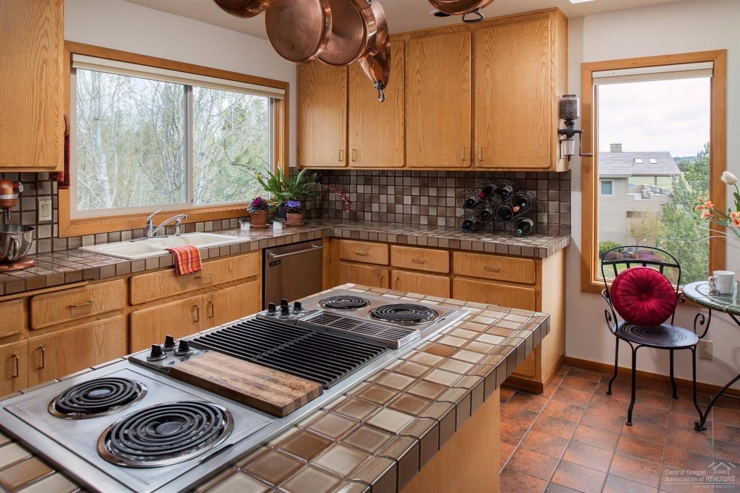 56872 River Road Sunriver, OR 97707 - Photo 10 of 21 The kitchen offers plenty of storage &am