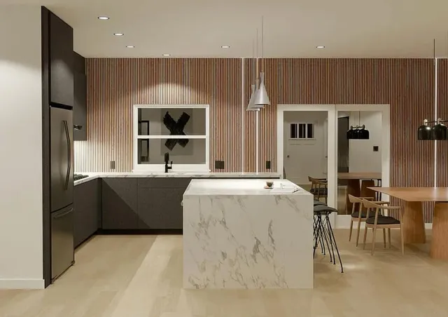 a living room with stainless steel appliances kitchen island granite countertop a refrigerator and a sink