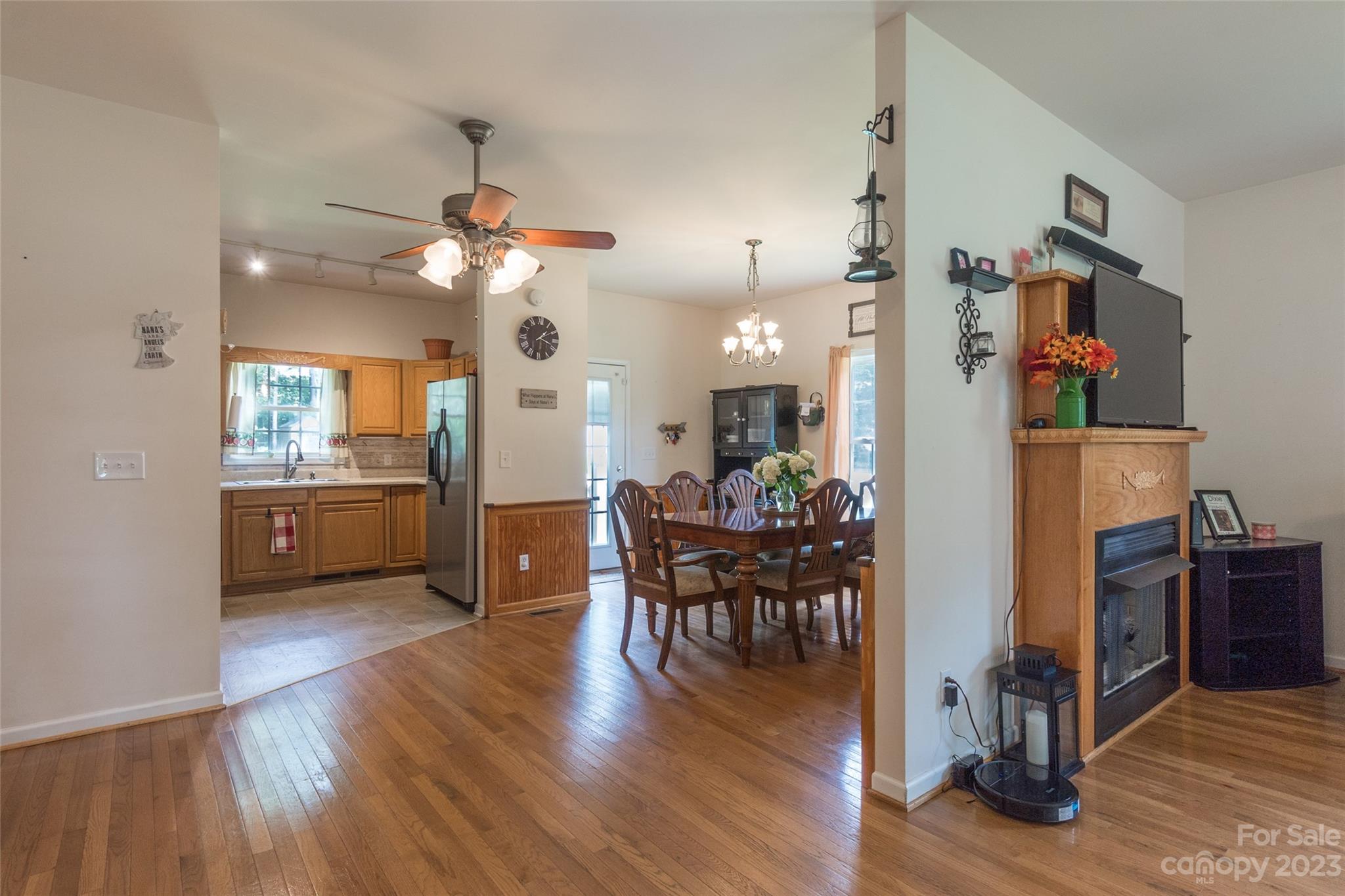 2070 Smithford Road Hickory Grove, SC 29717 - Photo 14 of 39 a view of a dining room with furniture and wooden floor