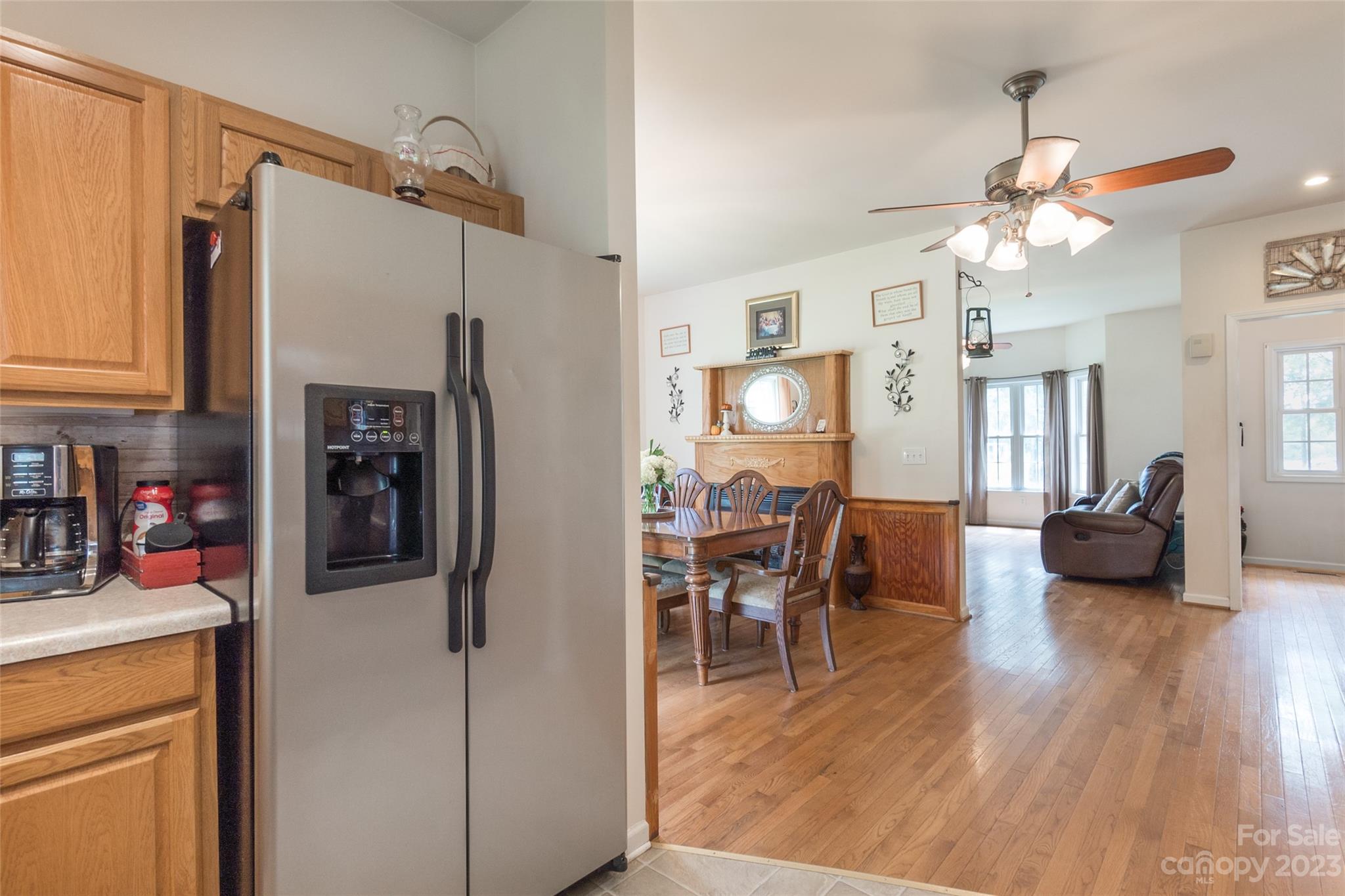 2070 Smithford Road Hickory Grove, SC 29717 - Photo 20 of 39 a kitchen view with furniture a refrigerator and cabinets