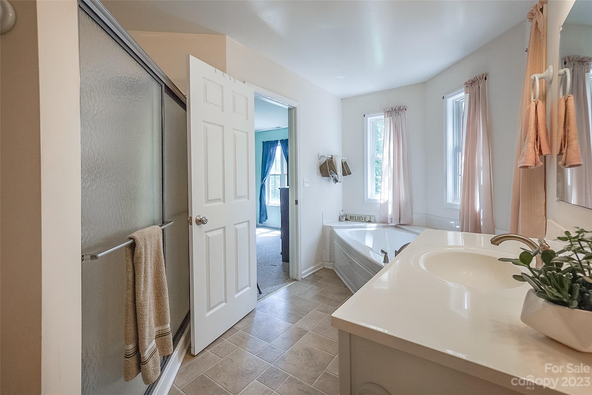 2070 Smithford Road Hickory Grove, SC 29717 - Photo 35 of 39 a spacious bathroom with sink shower and bathtub