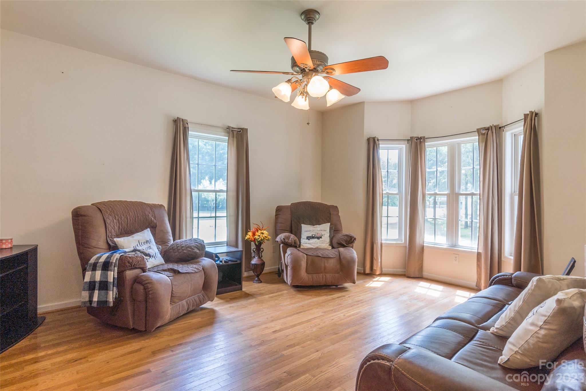 2070 Smithford Road Hickory Grove, SC 29717 - Photo 10 of 39 a living room with furniture and a large window