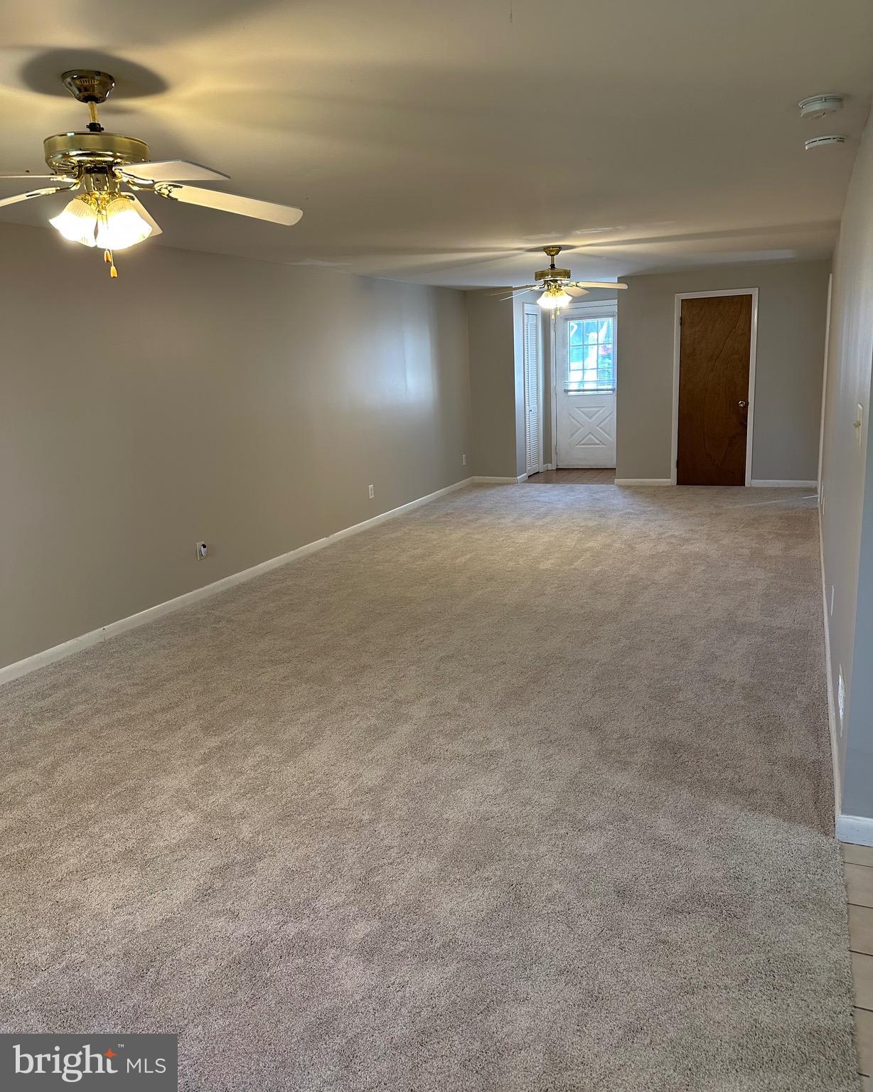 6020 Hanover Road Hanover, MD 21076 - Photo 26 of 42 a view of an empty room with a chandelier fan