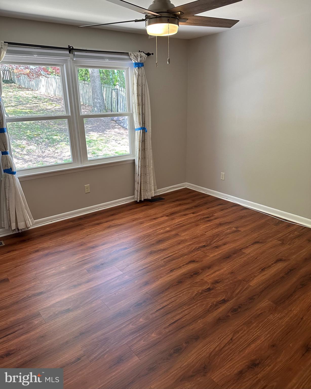 6020 Hanover Road Hanover, MD 21076 - Photo 38 of 42 wooden floor in an empty room with a window