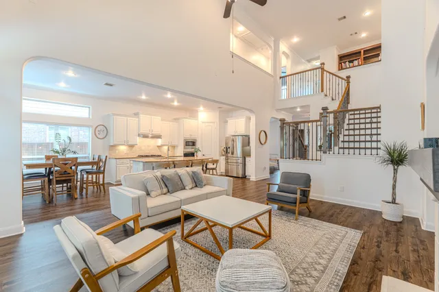 a living room with furniture and a table