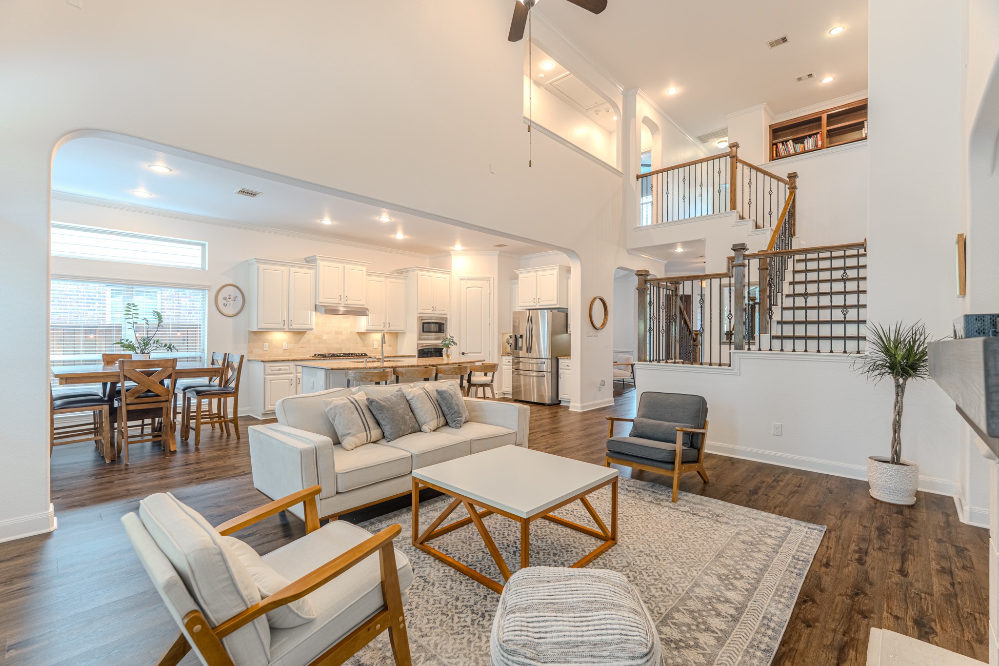 a living room with furniture and a table
