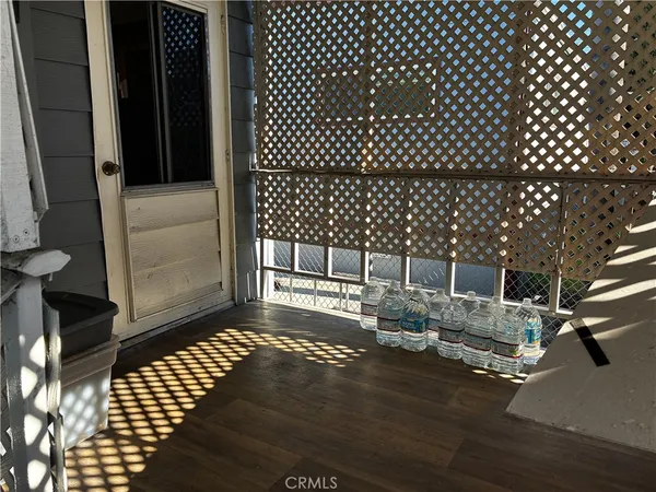 a view of front door and deck