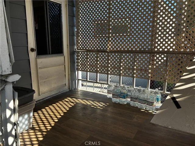 a view of front door and deck