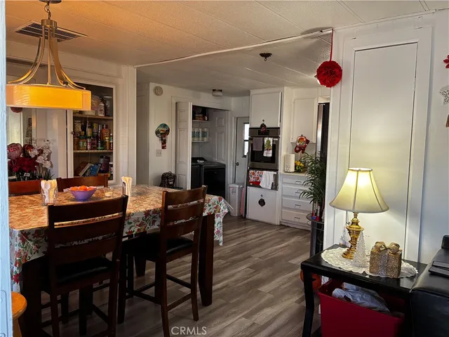 a living room with fireplace furniture and a flat screen tv