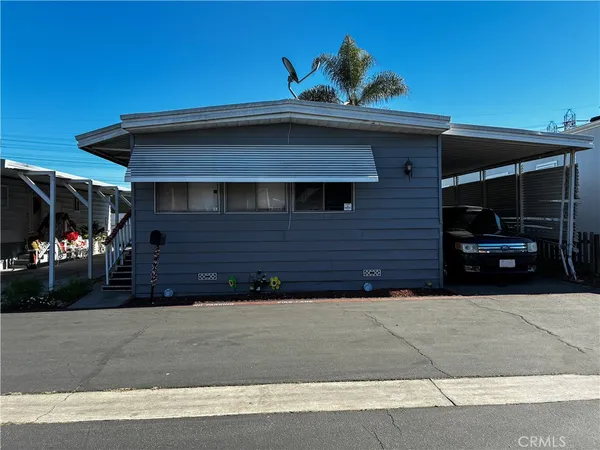 a front view of a house with garage